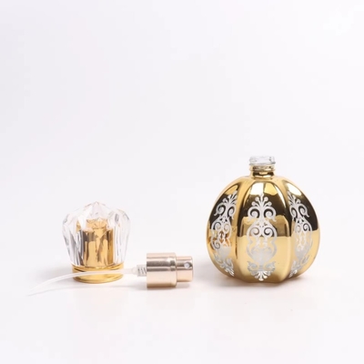 50ml UV Engraving Golden Pumpkin Shaped Perfume Glass Bottle With UV Acrylic Lid